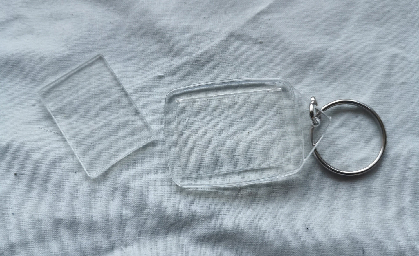 17 CROSS STITCH KEY RINGS SIZE 25MM X 35MM BITS INCLUDING P&P TO UK CODE 110